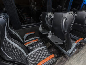 black and brown interior of coach bus