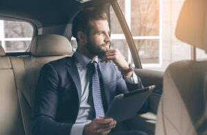 passenger sitting in sedan